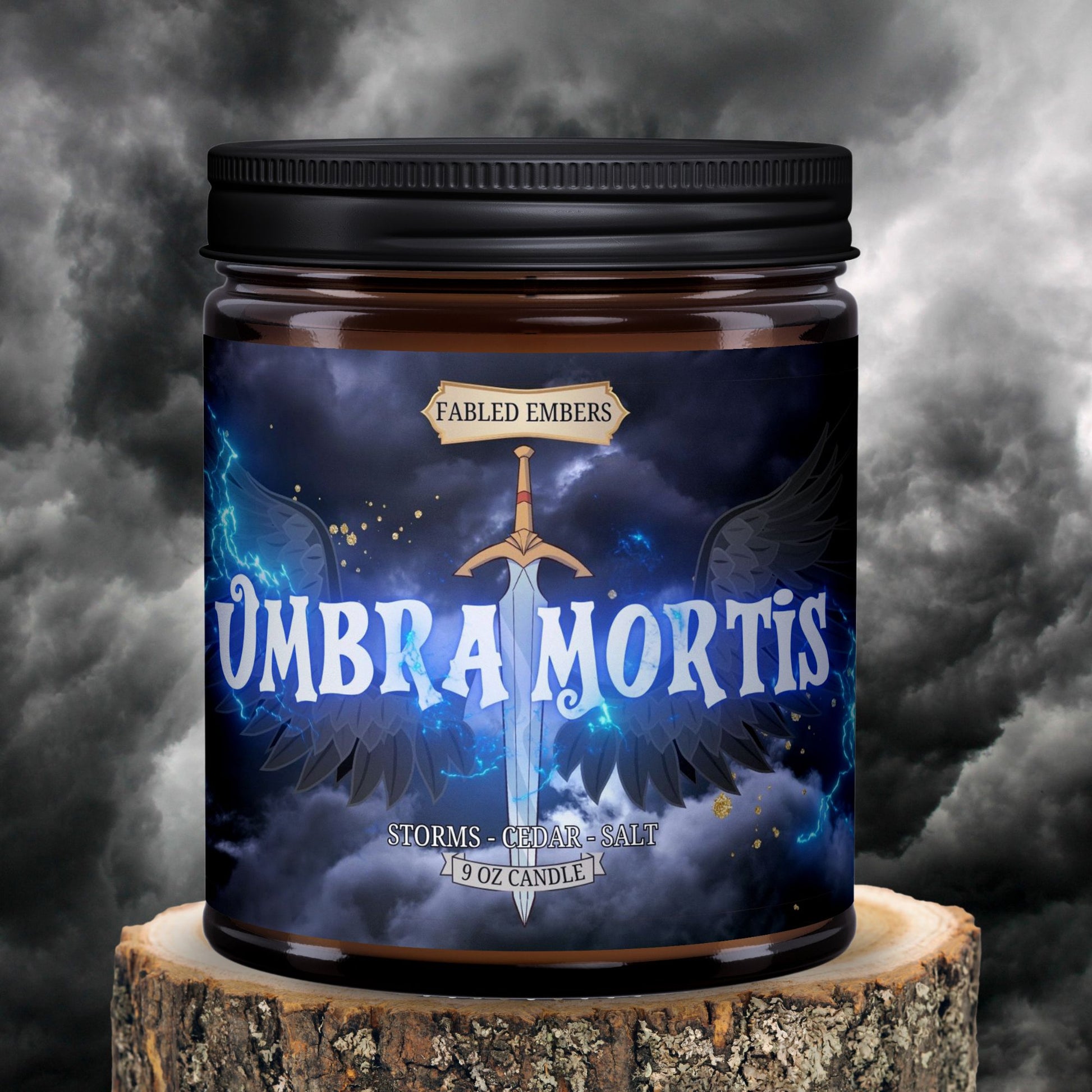 The Umbra Mortis inspired by CC 9oz candle in an amber glass jar with a full color label. Smells like the air before a storm.